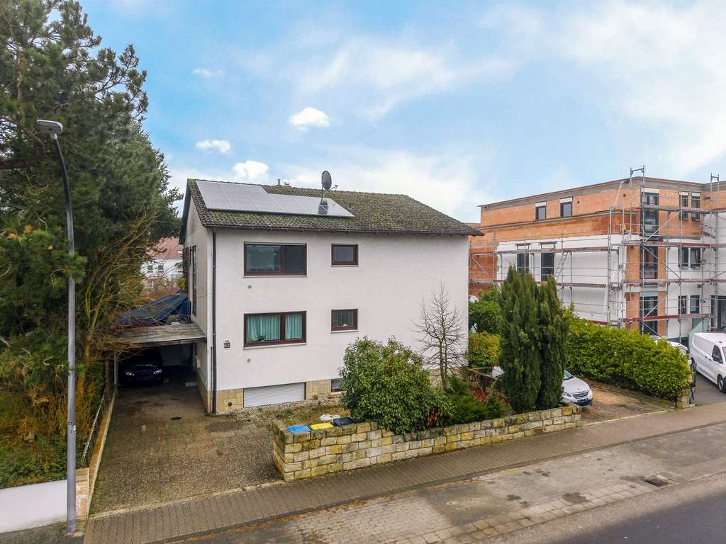 Immobilie in Büttelborn - Eigennutzung oder Kapitalanlage: Zweifamilienhaus mit Garten, Balkon und PV-Anlage in Büttelborn - Bild 2