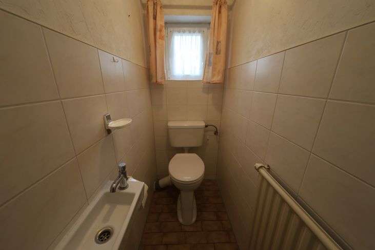 Immobilie in Groven - Gediegenes Einfamilienhaus auf schönem Grundstück mit altem Baumbestand in Lunden, Kreis Dithmarsche - Bild 2