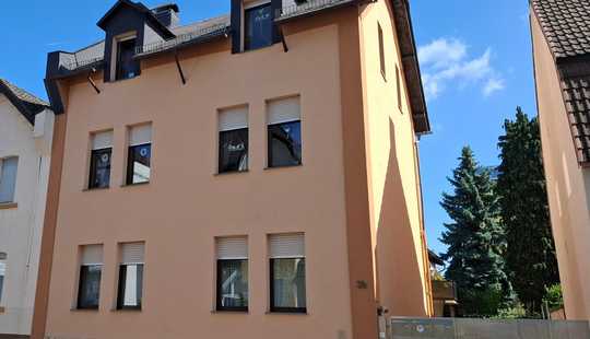 Bild von Wohnensemble aus klassischem Stadthaus (1905) und modernem Wohnhaus-Anbau (1993)