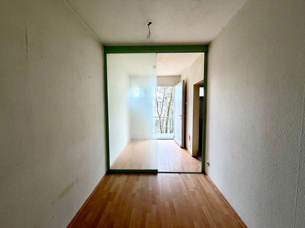 Immobilie in Darmstadt - Renovierungsbedürftiges Appartement mit Balkon und Tiefgaragenstellplatz in Arheilgen - Bild 3