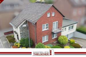 Großzügiges Zweifamilienhaus mit Balkon, Terrasse, Garten und 2 Tiefgaragen im idyllischen Loverich – Die vollständige Adresse der Immobilie erhältst du vom Anbieter., 52499 Baesweiler – Vorschaubild 1