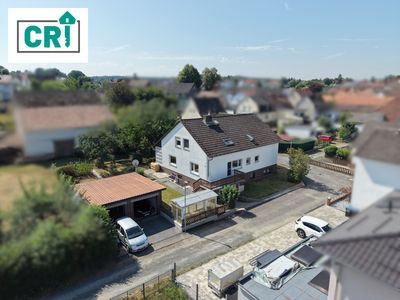 Großzügiges 1-2 Familienhaus in begehrter Feldrandlage – Ideal für die ganze Familie