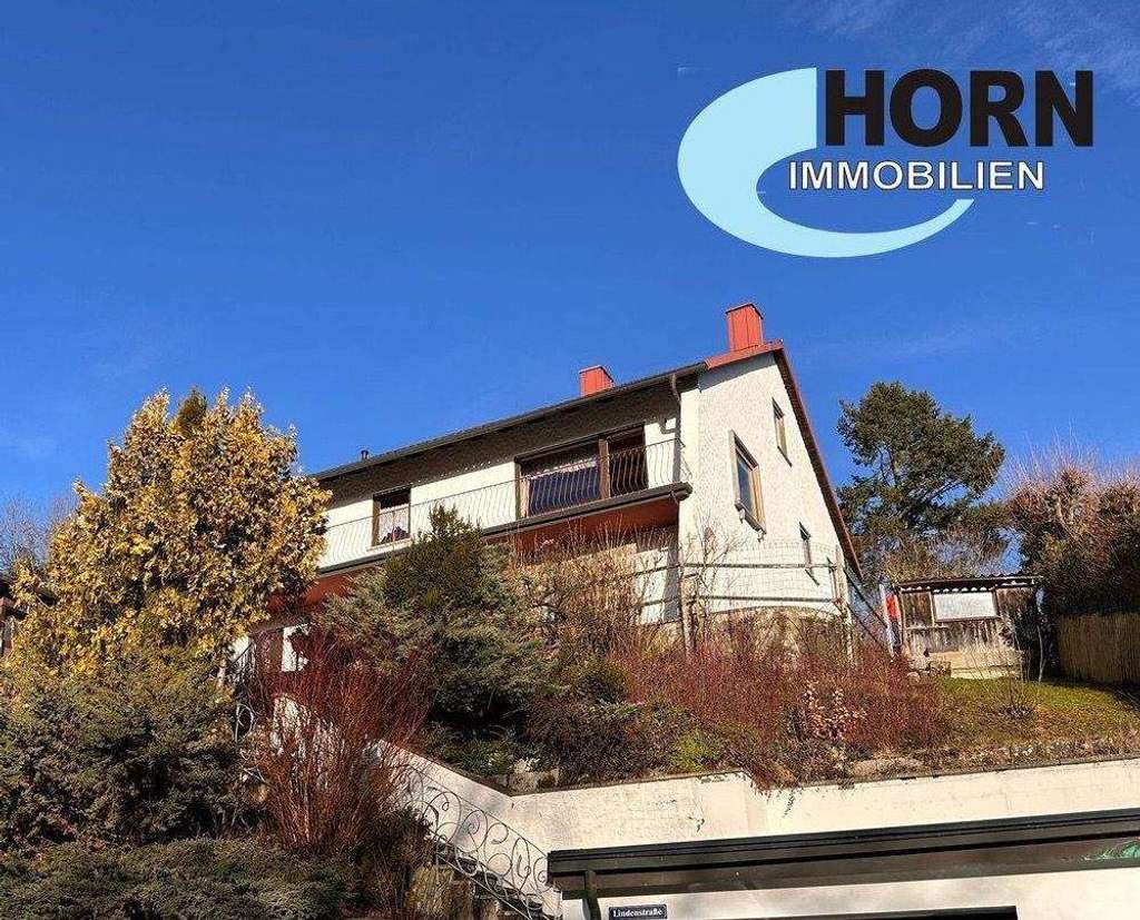 Immobilie in Schonungen - Einfamilienhaus mit Einliegerwohnung, genialer Ausblick inklusive! - Bild 0