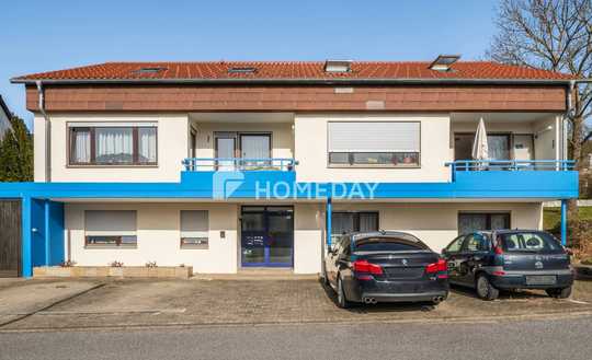 Solide vermietetes Mehrfamilienhaus mit 6 Wohneinheiten, Garten und Doppelgarage in ruhiger Hanglage