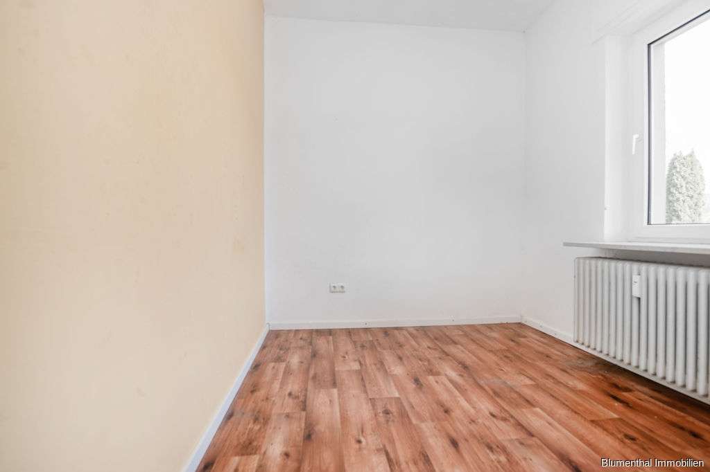 Immobilie in Enger - Zweifamilienhaus mit großzügigem Garten gen Süden in Westerenger - Bild 1