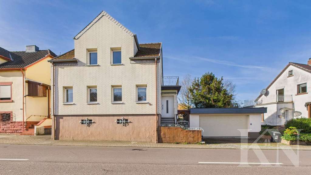 Immobilie in Heusweiler - Geräumiges Einfamilienhaus mit Garten, Garage und vielfältigen Möglichkeiten! - Bild 0