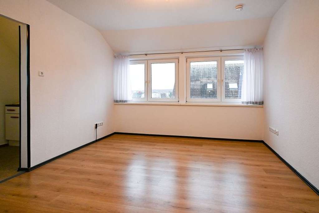 Immobilie in Ratekau - Unweit der Ostsee! Gemütliche Dachgeschosswohnung in Ratekau - Bild 1