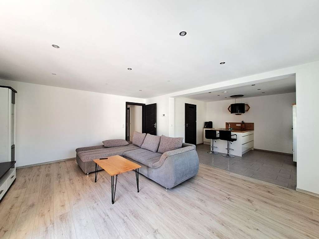 Immobilie in Lustadt - Attraktive 3-Zimmer Wohnung mit Balkon und Gartenanteil - Bild 1