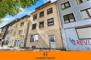 Großzügige 2,5-Zimmer-Wohnung mit Kamin, modernisiertem Bad & Potenzial