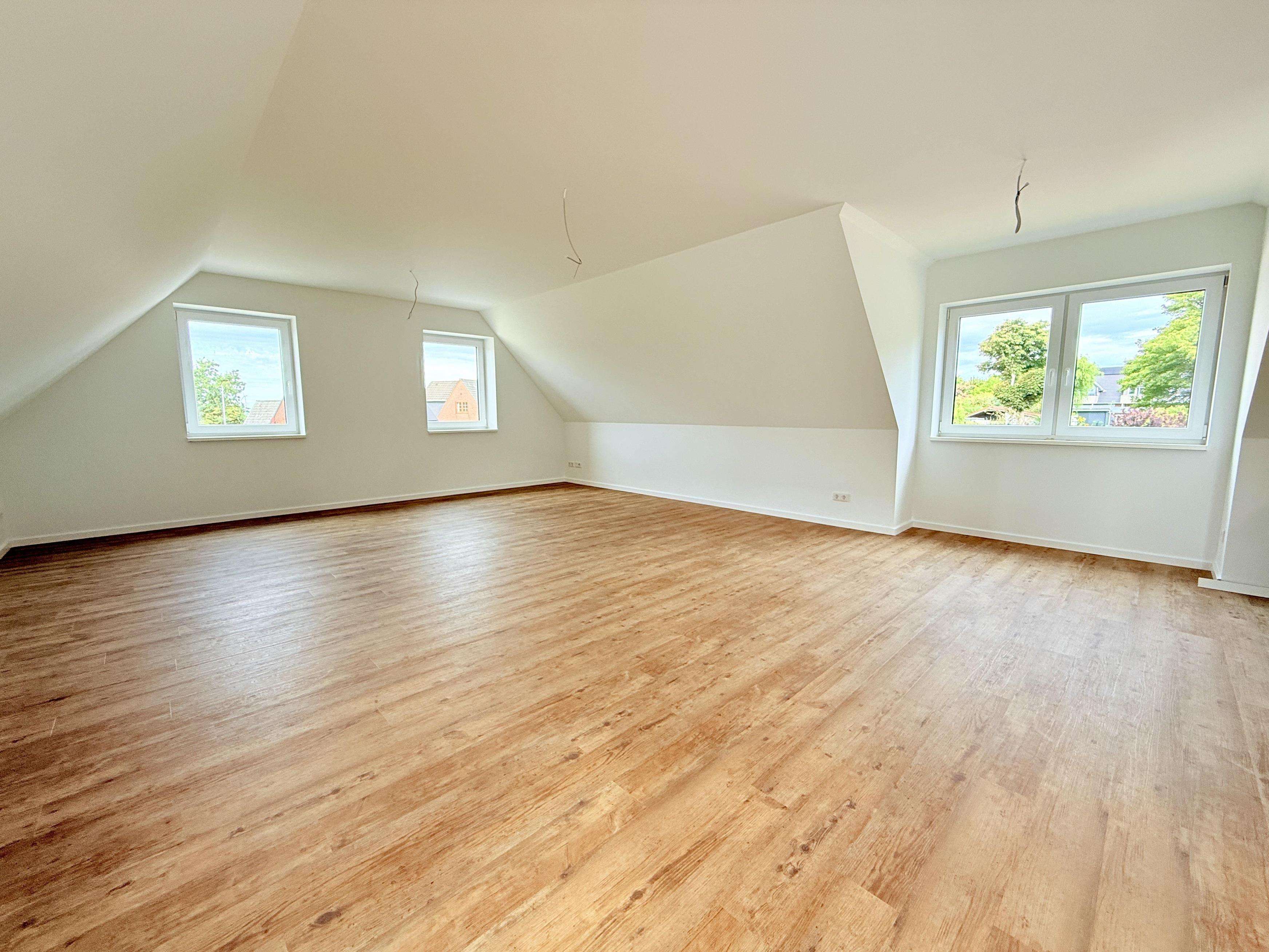 Immobilie in Breklum - ERSTBEZUG: Moderne 2-Zimmer Eigentumswohnung mit PKW-Stellplatz! -beziehen Sie Ihre eigene Etage- - Bild 0