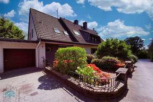 ***Repräsentatives Wohnen in Toplage – Architektenhaus mit weitläufigem Garten