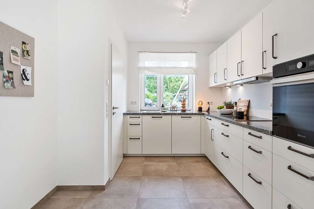 Immobilie in Hoisdorf - Erstbezug: Hochwertige Doppelhaushälfte in zweiter Reihe mit idyllischem Garten - Bild 4