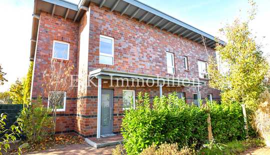 Bild von Architektenhaus mit Einliegerwohnung und separatem Gewerbeobjekt – Wohnen und Arbeiten vereint