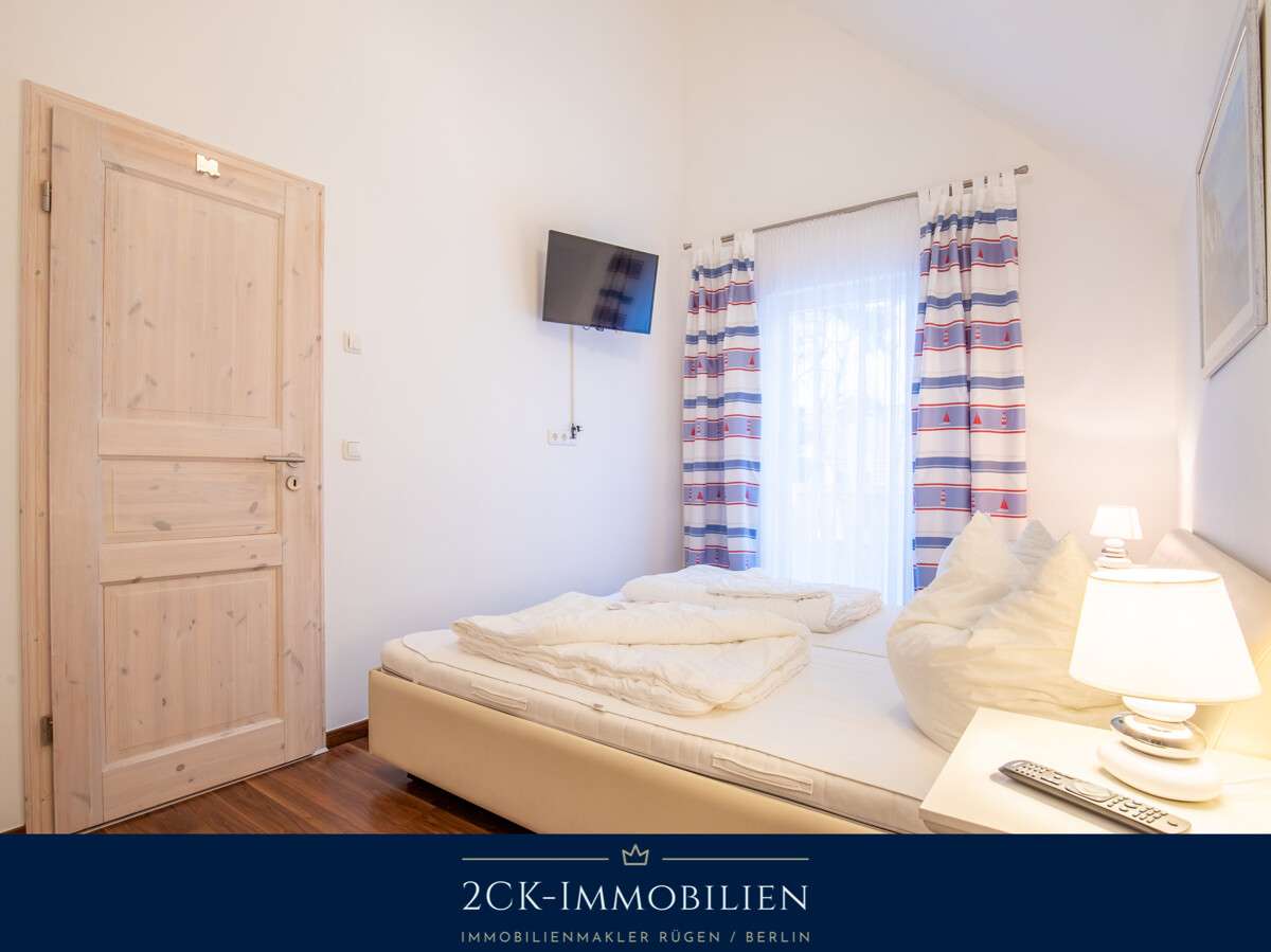 Immobilie in Glowe - 2 Zimmer Premium Ferienwohnung in Glowe, strandnah, zwei Balkone, Sauna, Kamin, inkl. Stellplatz! - Bild 3