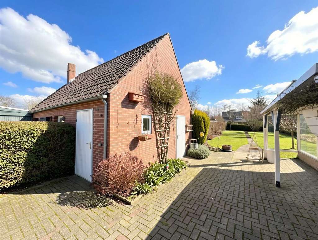 Immobilie in Schortens - Doppelhaushälfte mit Wintergarten & Garage in Roffhausen - Bild 2