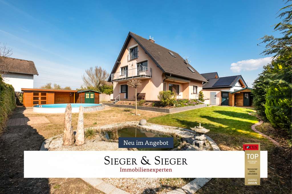 Immobilie in Niederkassel - Wohnen mit Freiraum – charmantes freistehendes Haus mit großem Garten und Pool - Bild 0