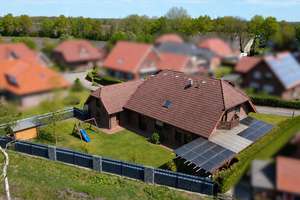 Einfamilienhaus mit viel Platz in familienfreundlicher Lage! Wärmepumpe, PV-Anlage, Terrasse – Die vollständige Adresse der Immobilie erhältst du vom Anbieter., 26897 Hilkenbrook – Vorschaubild 2