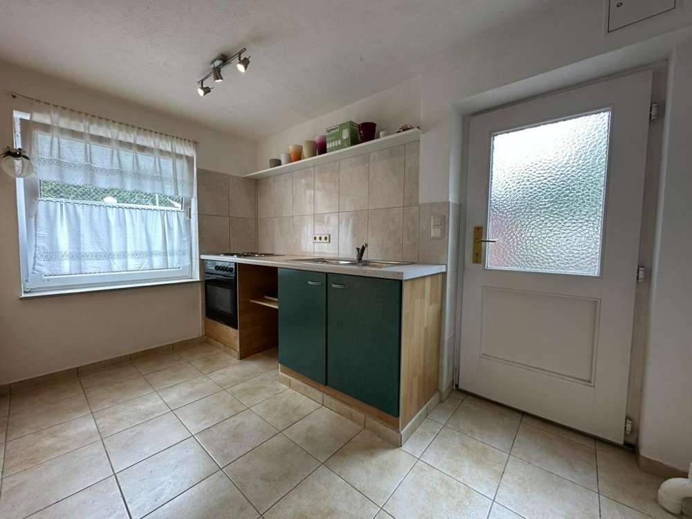 Immobilie in Bollewick - Einfamilienhaus mit Südterrasse und Einliegerwohnung im idyllischen Wohngebiet unweit der Müritz (ca - Bild 1