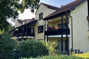 Attraktive 2-Zimmer-Wohnung mit Süd-Balkon, Tiefgaragenstellplatz und langfristig gesichertem Mieter