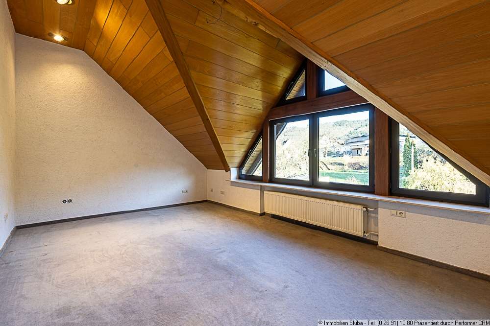 Immobilie in Hönningen - Zwei Einfamilienhäuser im Ortskern von Hönningen: Eigenheim und Anlageobjekt ideal kombinierbar - Bild 1