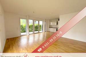 Moderne Erdgeschosswohnung mit Einabuküche und Terrasse