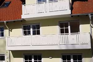 Neuwertige 3-Zimmer-Wohnung mit Balkon, Garten & Duplexgarage