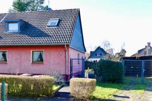 Charmante Doppelhaushälfte mit herrlichem Garten in Alt-Vogelsang