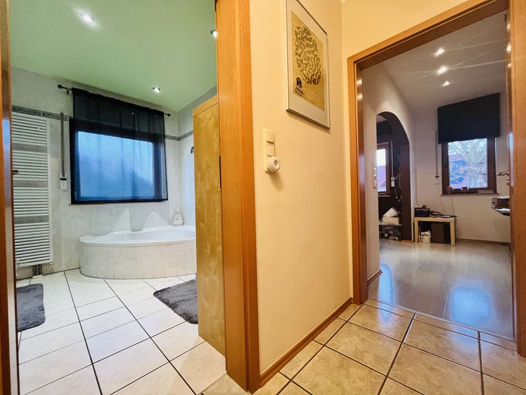 Immobilie in Hünfelden - BUNGALOW ** Exklusive Wohn-Oase mit Einliegerwohnung! ** - Bild 2