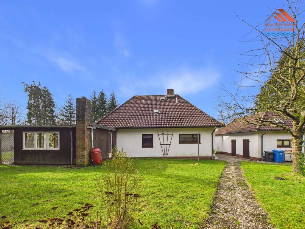 Immobilie in Neuenkirchen - Nostalgie trifft Potenzial: Freistehendes Einfamilienhaus auf großem Naturgrundstück in Neuenkirchen - Bild 2