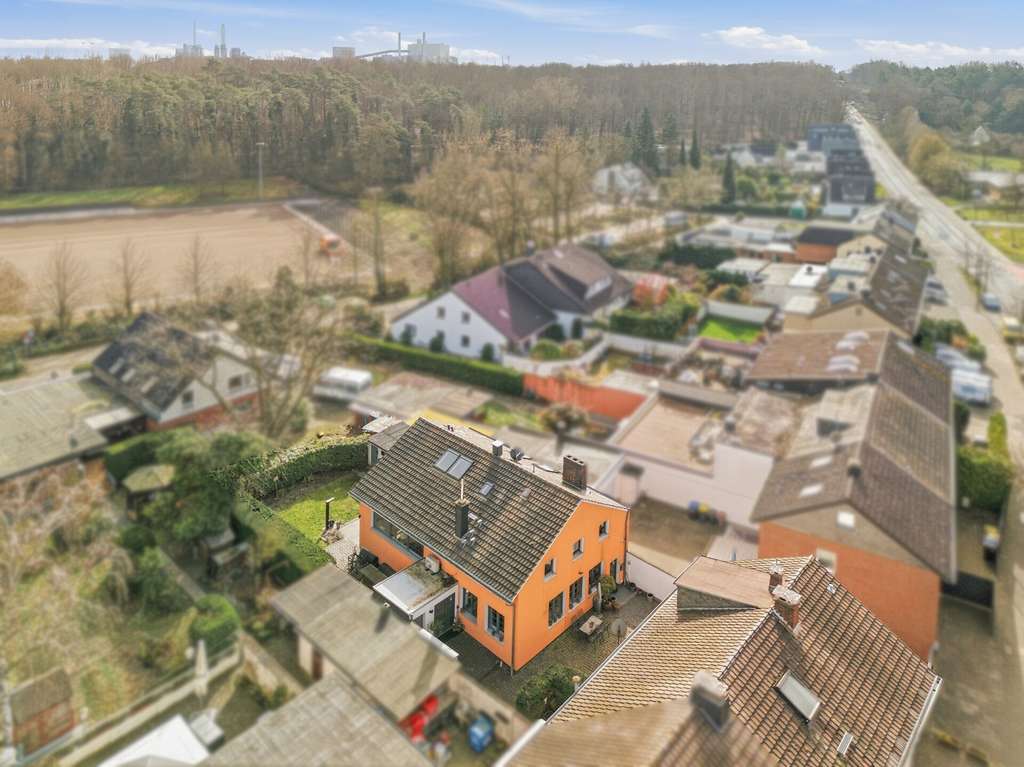 Immobilie in Hürth - Luxus-Einfamilienhaus + Wohn- & Geschäftshaus in Hürth | Zwei Häuser im Paket - Bild 1