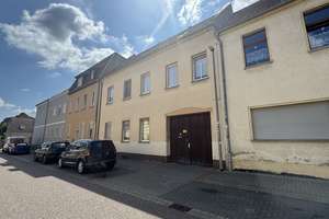Zweifamilienhaus mit Garten, Garagen und Ausbaupotenzial – Ideal für Familien & Kapitalanleger – Die vollständige Adresse der Immobilie erhältst du vom Anbieter., 6862 Roßlau, Dessau-Roßlau – Vorschaubild 2