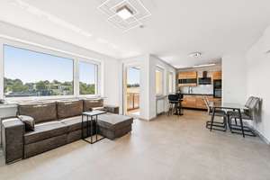 Großzügige 4-Zimmer-Eigentumswohnung mit zwei Balkonen, Tiefgarage und Weitblick