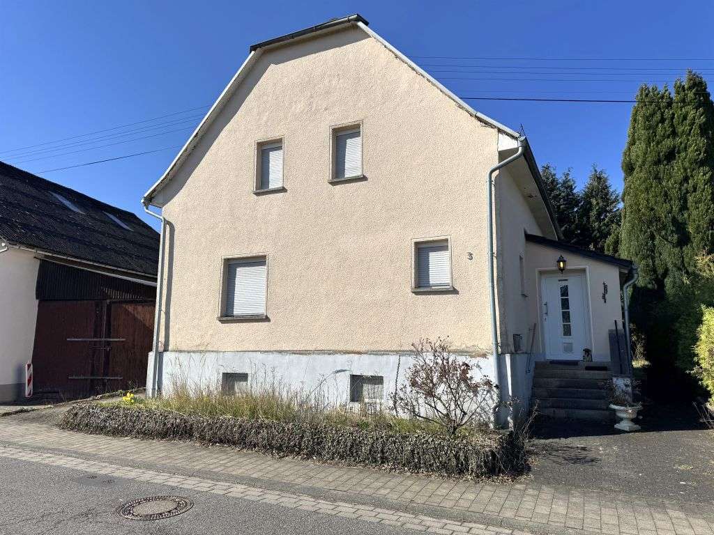 Immobilie in Dierdorf - Handwerkerobjekt: Einfamilienhaus mit Entwicklungsmöglichkeiten - Bild 1