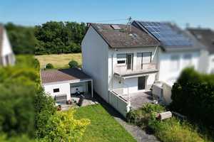 Charmantes Reihenhaus in naturnaher Lage an der Nidda! – Frankfurt am Main – Vorschaubild 1