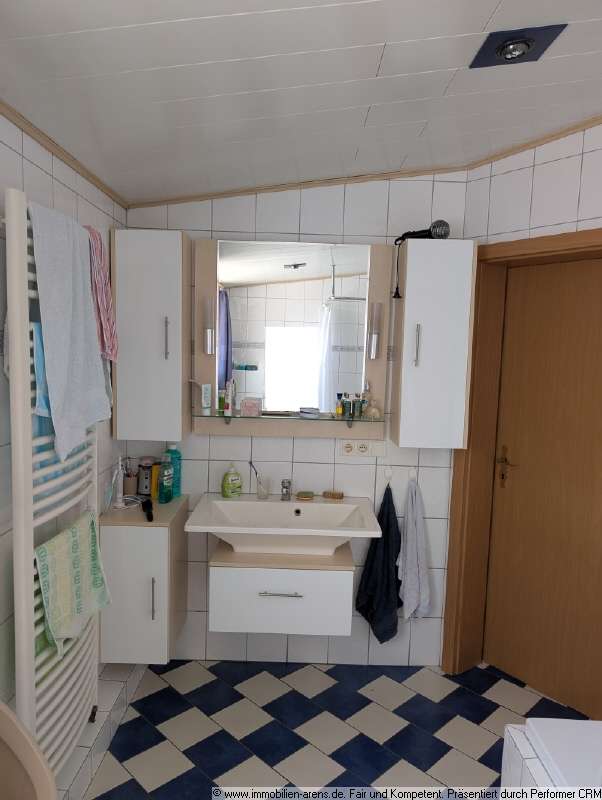 Immobilie in Apen - solides Klinkergebäude mit Garage und Wintergarten in Apen - Bild 0