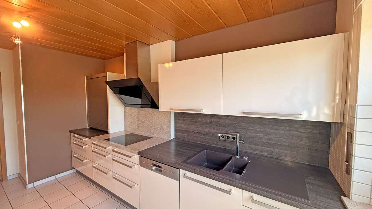 Immobilie in Dinslaken - Großzügige Maisonette-Eigentumswohnung mit Garage auf einem Erbpachtgrundstück in Dinslakener Bruch - Bild 0