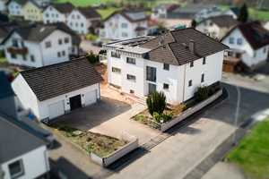 Kernsaniertes Zweifamilienhaus mit großem Grundstück und Nebengebäude – Main-Kinzig-Kreis – Vorschaubild 1