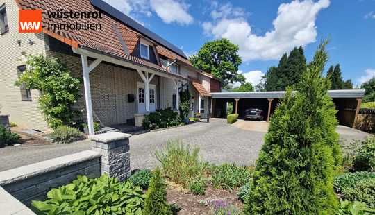 Bild von EFH mit Einliegerwohnung, Photovoltaikanlage, großem Carport und Abstellfläche
