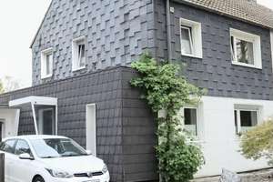 Familienfreundliche Doppelhaushälfte mit Kamin, Traumgarten in Oberhausen-Lirich-Nord