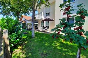Erdgeschosswohnung mit Garten und Sondernutzungsrecht für zusätzlichen Schrebergarten