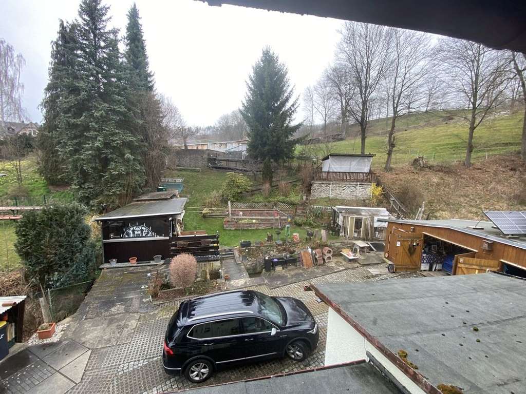 Immobilie in Grünhainichen - Einfamilienhaus mit Doppelgarage und schönem Garten - Bild 4