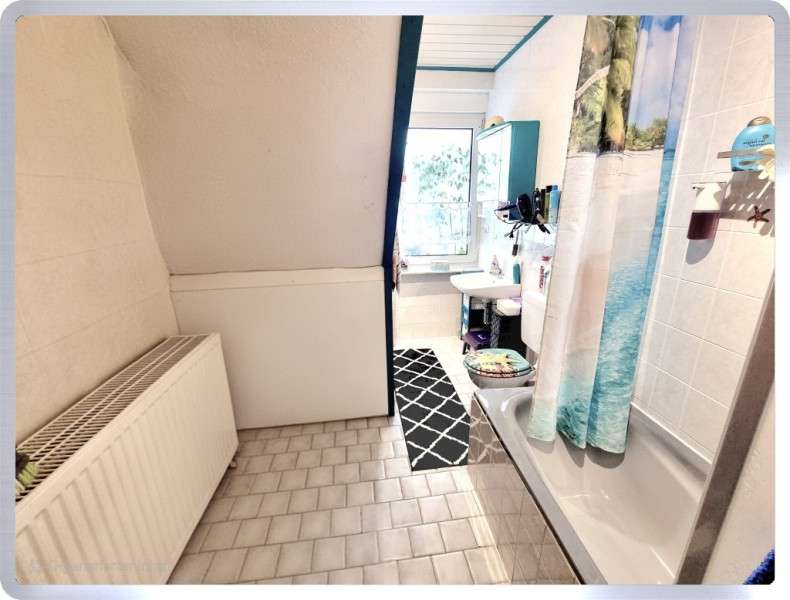 Immobilie in Rüdesheim am Rhein - * Rüdesheim am Rhein: Überwiegend modernisiertes Reihenhaus in ruhiger Wohnlage * - Bild 0