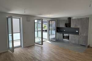 Erstbezug | Sonnige 3,5-Zimmer Wohnung | Einbauküche | Balkon | Einzelgarage | KFW55 | ER-Zentrum