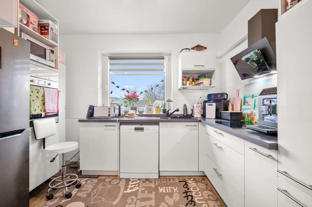 Immobilie in Harrislee - Modernisierte 2-Zimmer-Wohnung mit Westbalkon & TG-Stellplatz - vermietet - Bild 2