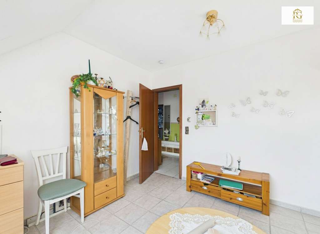 Immobilie in Neuenkirchen - Gepflegte Eigentumswohnung mit Terrasse und Gartenhaus in einem gepflegtem Mehrfamilienhaus in Neuen - Bild 4