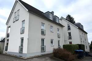 Erdgeschosswohnung mit Balkon.