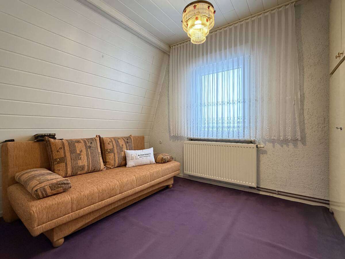 Immobilie in Sandersdorf-Brehna - Wohnen in Zscherndorf: Doppelhaushälfte auf zwei Etagen mit Garten und Garage - Bild 0