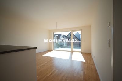 Neubau-Erstbezug mit Balkon, Einbauküche, Stellplatz & E-Lademöglichkeit