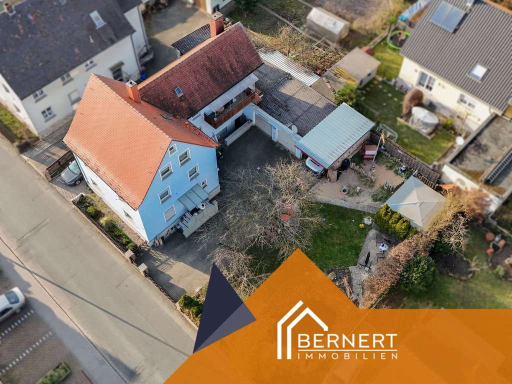 Immobilie in Gundelsheim - Großzügiges Mehrfamilienhaus mit Doppelgarage, Gartenidylle und vielseitigem Nutzungspotenzial - Bild 0