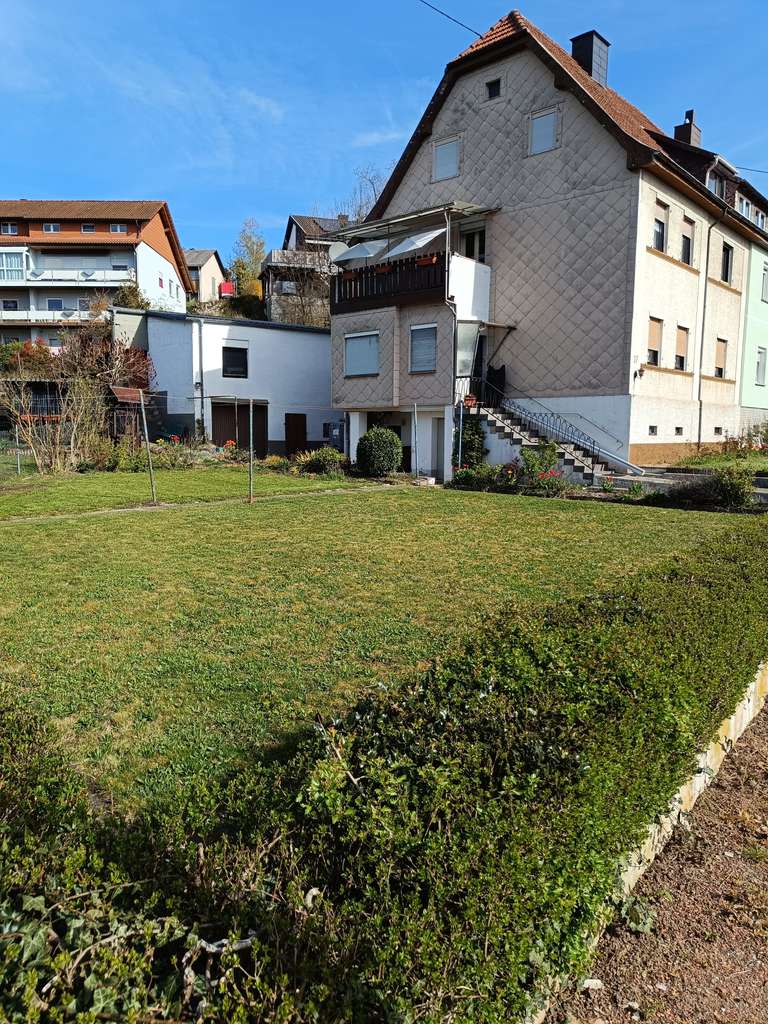 Immobilie in Neunkirchen - 3 FH mit toller Grundstücksanlage mit unterschiedlichen Nutzungsmöglichkeiten in Wiebelskirchen - Bild 0